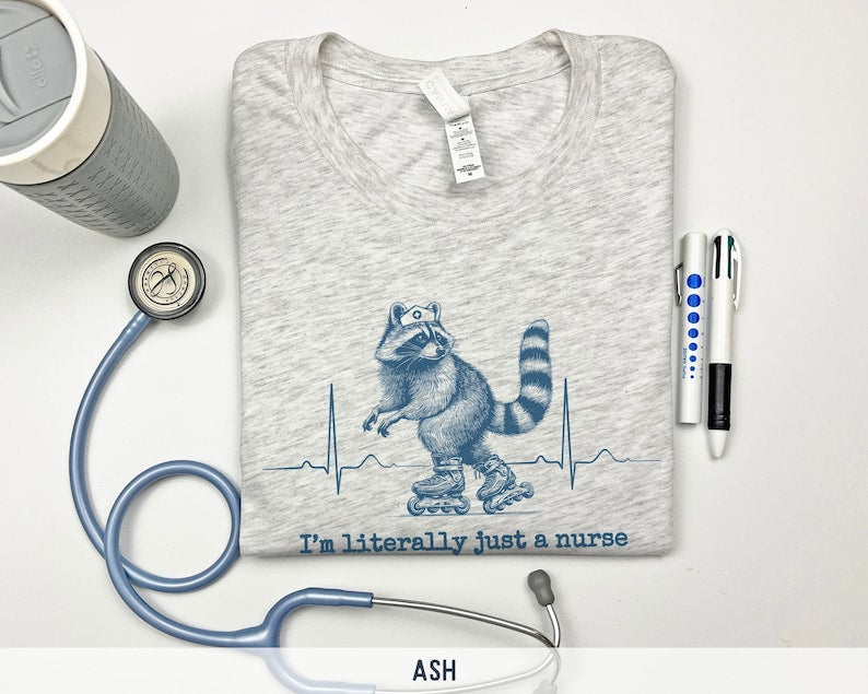 I'm Literally Just A Nurse roller skating raccoon shirt